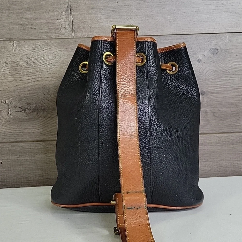 Vintage Dooney & Bourke Black and Tan Pebble  Leather Drawstring Bag